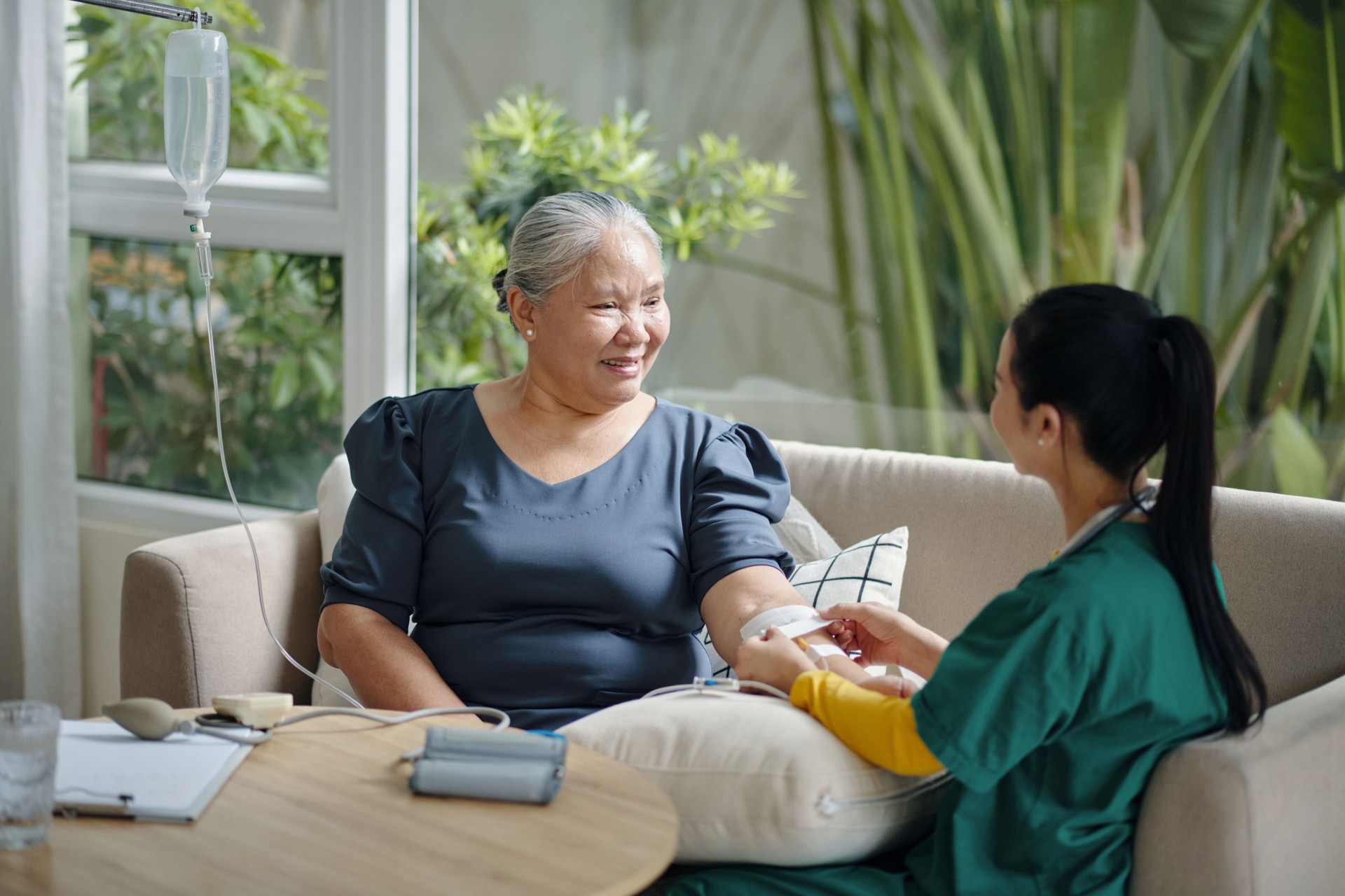 Caregiver Caring About Senior Woman