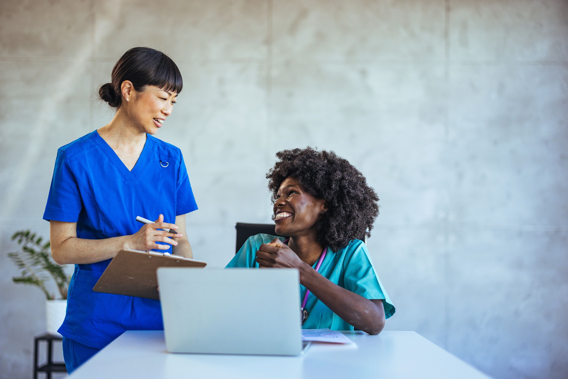 Friendly Medical Team Collaborating in a Modern Office Setting